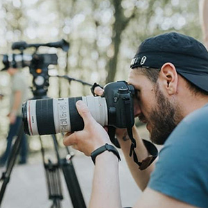 man looking into a camera